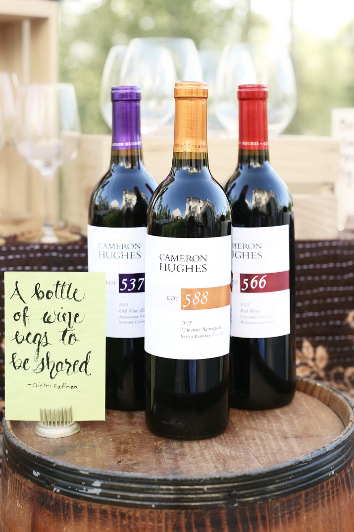 Three bottles of Cameron Hughes Wine and a note "A bottle of wine begs to be shared"