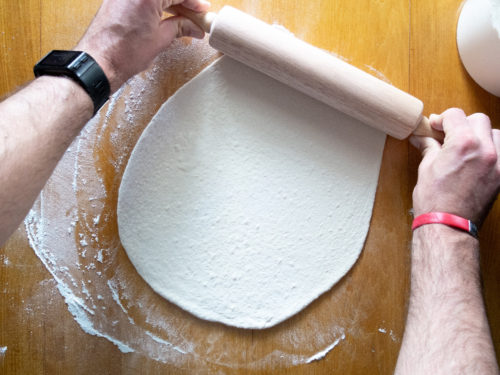 Brad rolling the pizza dough for summer date night