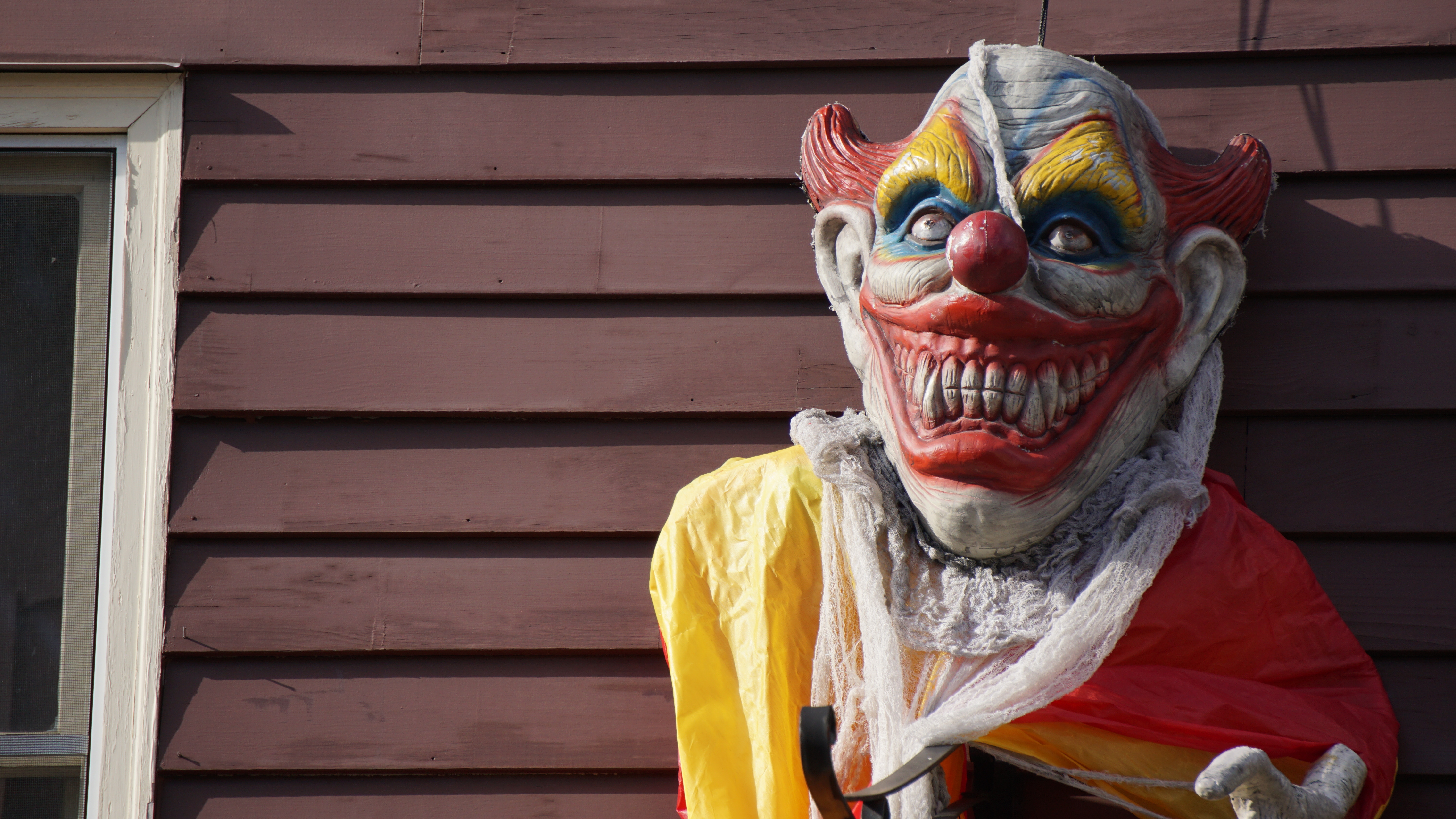 An evil Halloween clown costume